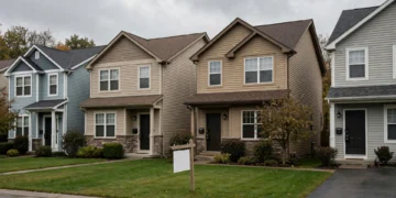 Suburban rental homes with key lockboxes on their doors